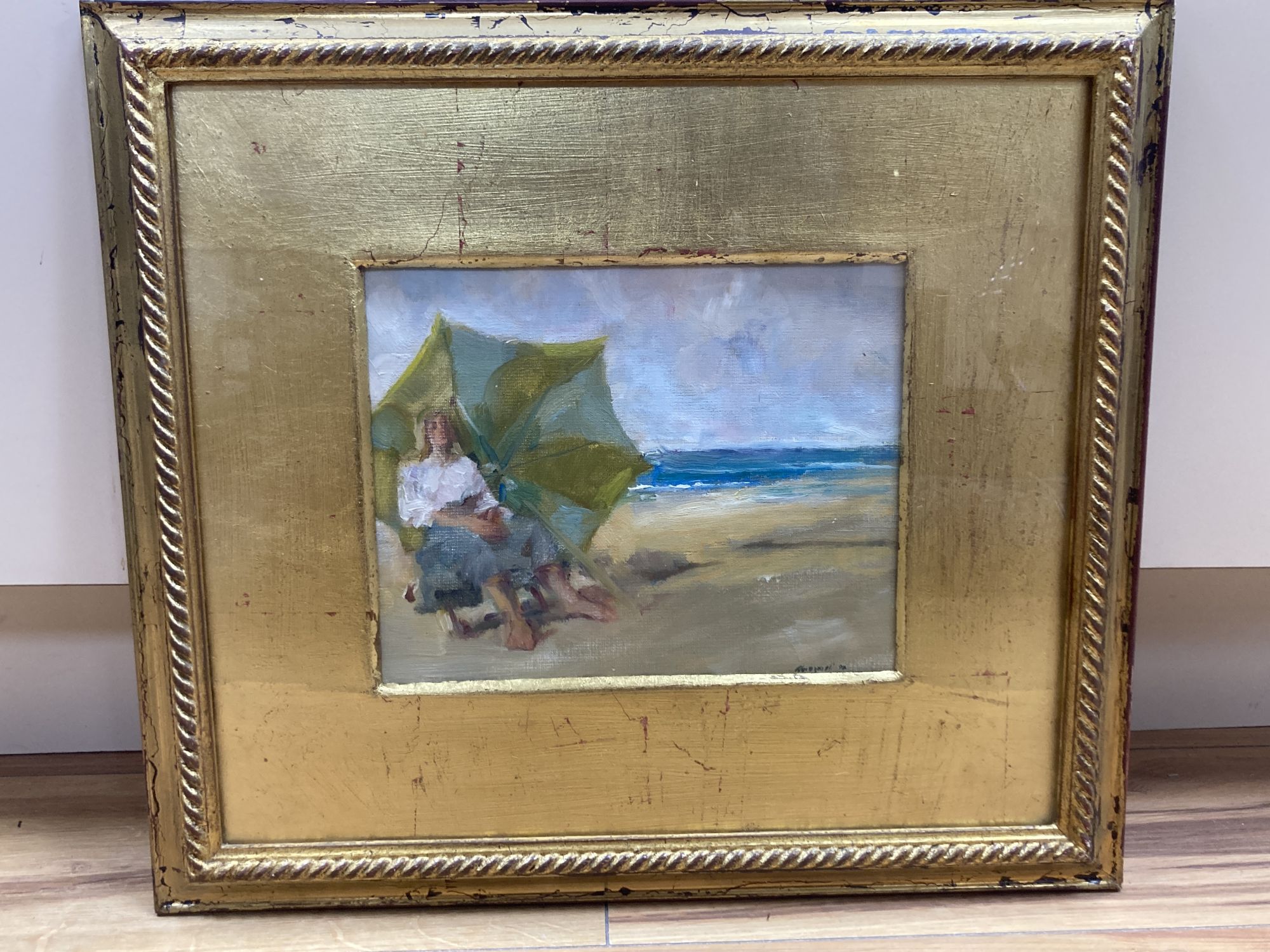 Italian School, oil on canvas board, Woman seated on a beach, indistinctly signed and dated, 19 x 24cm